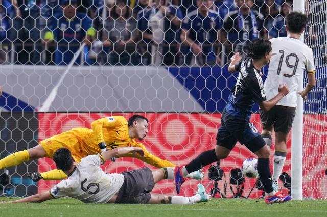 1725558780269064022.jpg (体育)(14)足球——世预赛:中国队对阵日本队XxjpseC007437_20240905_PEPFN0A001.jpg